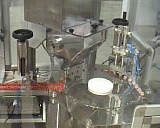 Полностью автоматическая машина для расфасовки микродоз порошков в плунжеры RAV06/2 купить в ГК Креатор